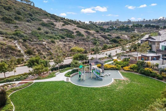 an aerial view of residential house with outdoor space