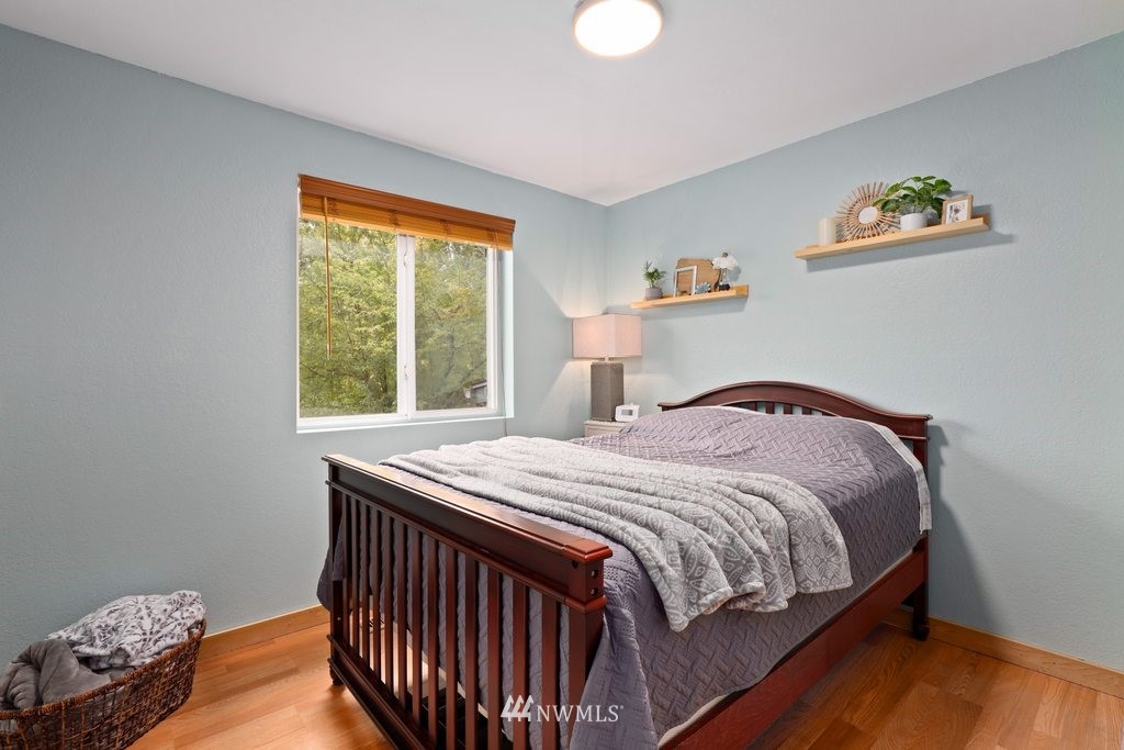 18216 19th Drive Southeast Bothell, WA 98012 - Photo 13 of 37 a bedroom with a bed and a window