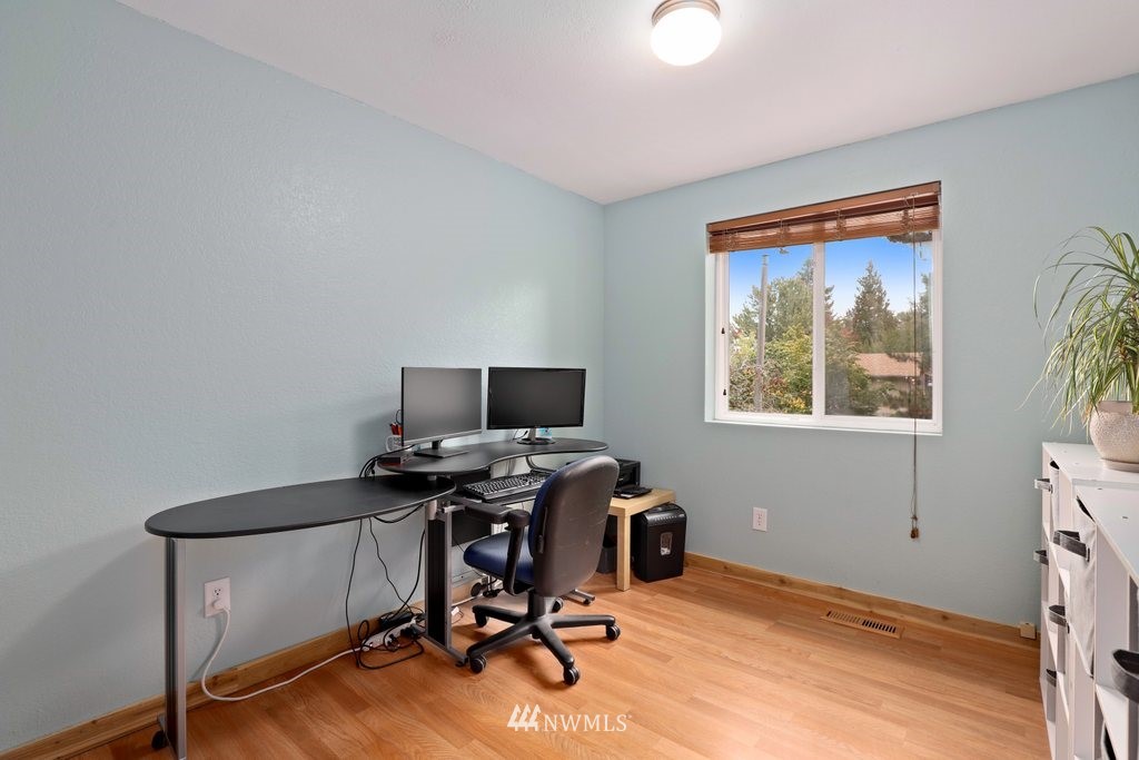 18216 19th Drive Southeast Bothell, WA 98012 - Photo 14 of 37 a view of a workspace with furniture and a window