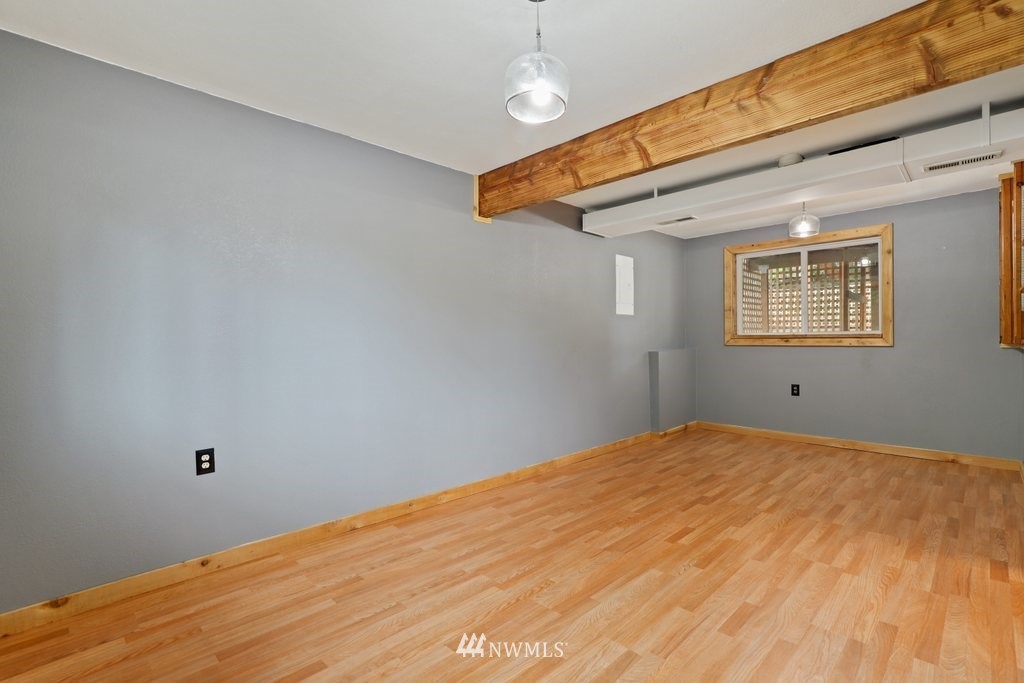 18216 19th Drive Southeast Bothell, WA 98012 - Photo 15 of 37 a view of a blue bed in a room