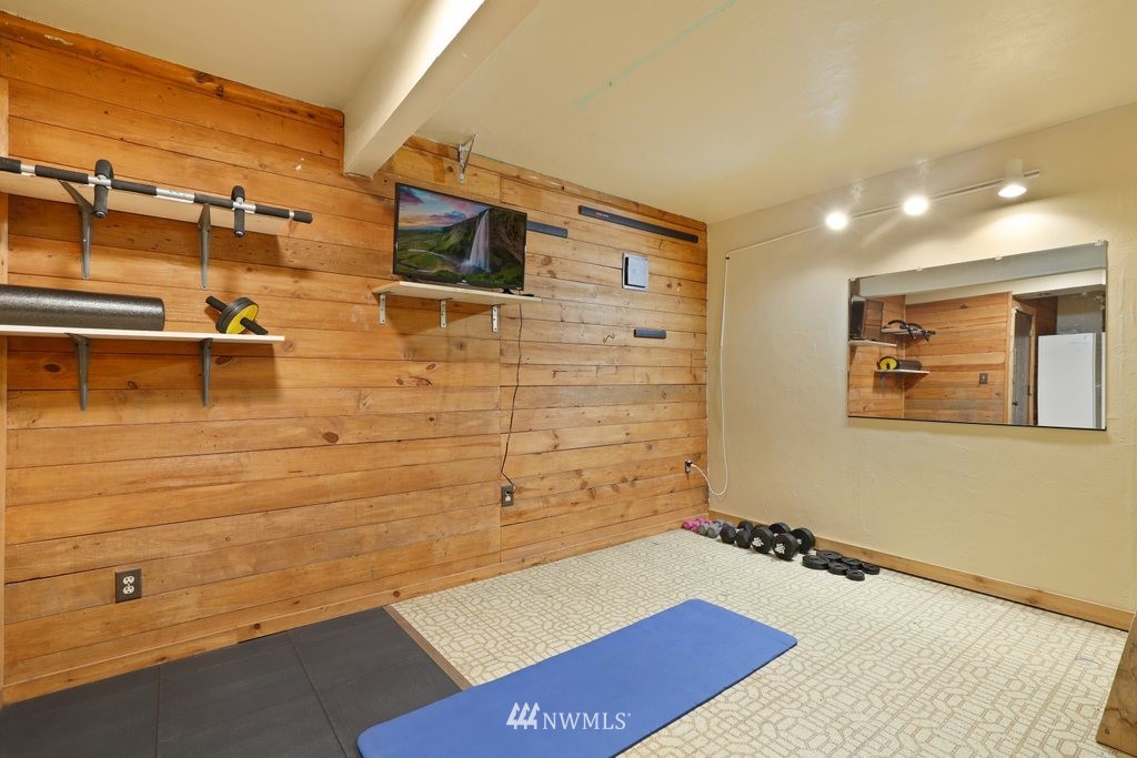 18216 19th Drive Southeast Bothell, WA 98012 - Photo 19 of 37 a bathroom with a tub and a shower