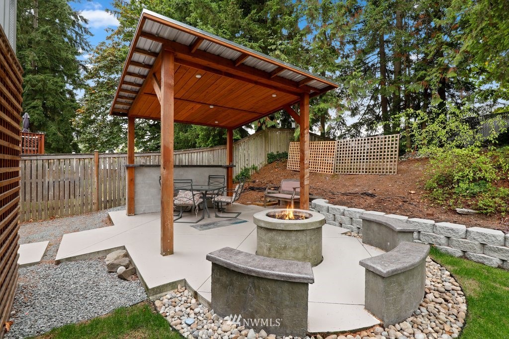 18216 19th Drive Southeast Bothell, WA 98012 - Photo 25 of 37 a view of house with backyard and outdoor seating