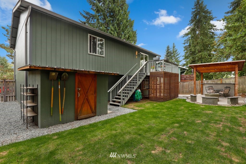 18216 19th Drive Southeast Bothell, WA 98012 - Photo 29 of 37 a view of backyard with deck and outdoor seating