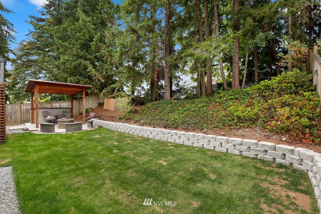 18216 19th Drive Southeast Bothell, WA 98012 - Photo 30 of 37 a view of backyard with swimming pool and green space