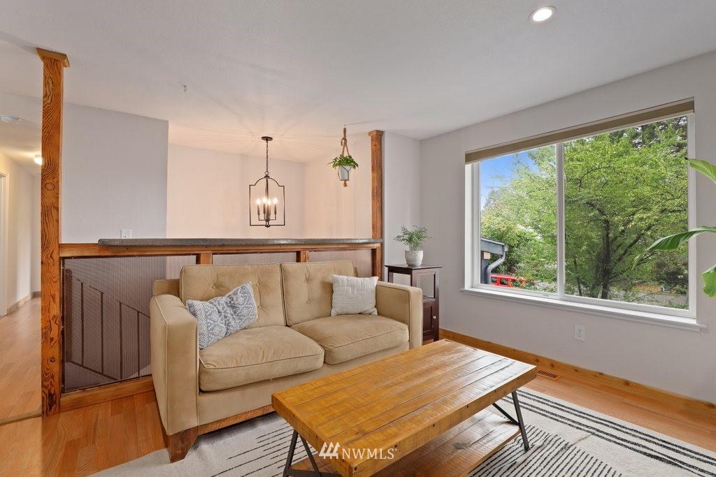 18216 19th Drive Southeast Bothell, WA 98012 - Photo 4 of 37 a living room with furniture and a window