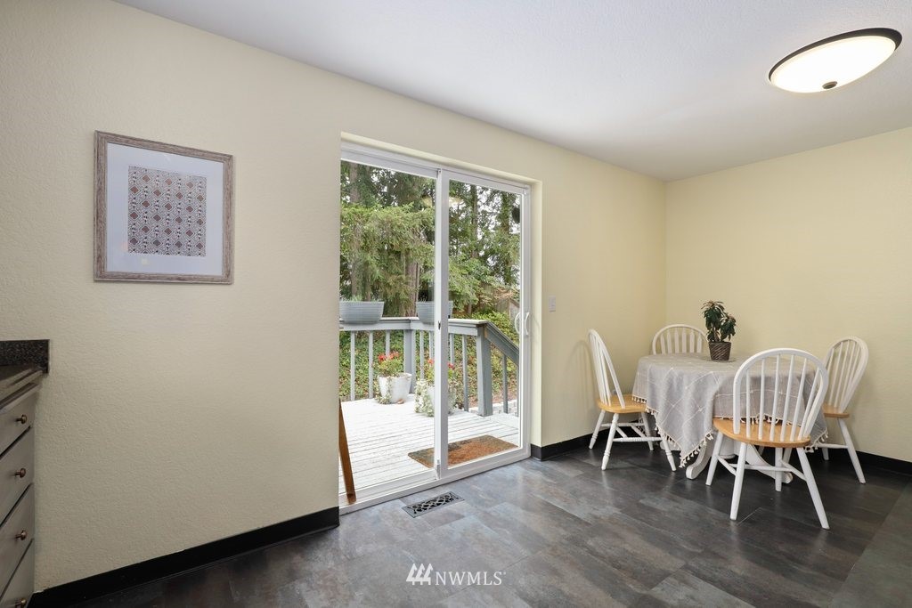 18216 19th Drive Southeast Bothell, WA 98012 - Photo 9 of 37 a view of a room with furniture and wooden floor