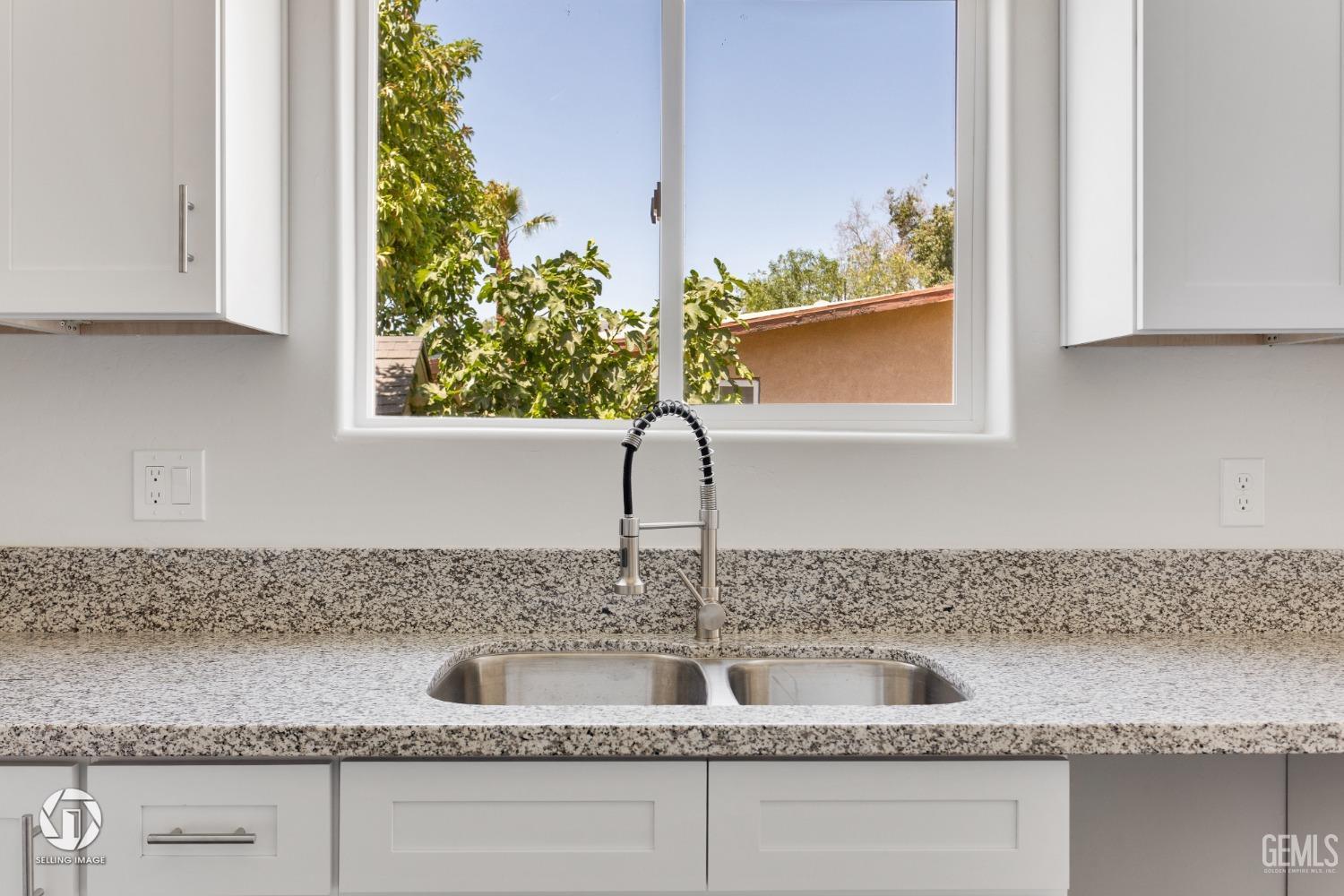 Undisclosed Address Bakersfield, CA 93305 - Photo 13 of 28 a close view of sink and tap