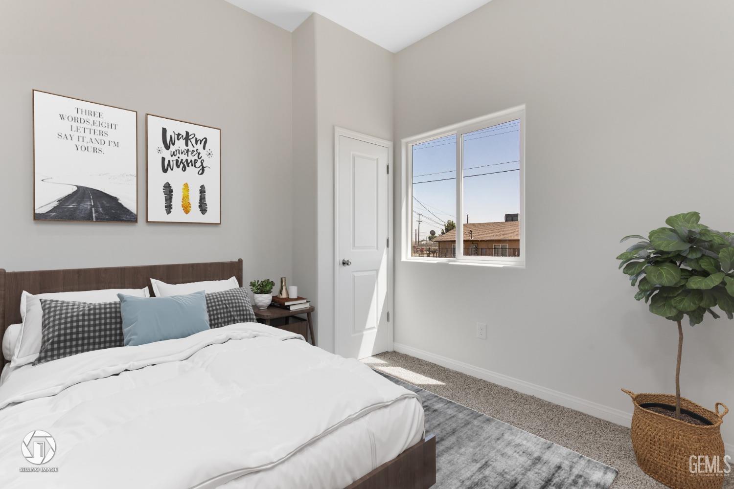 Undisclosed Address Bakersfield, CA 93305 - Photo 14 of 28 a bedroom with a bed and a window