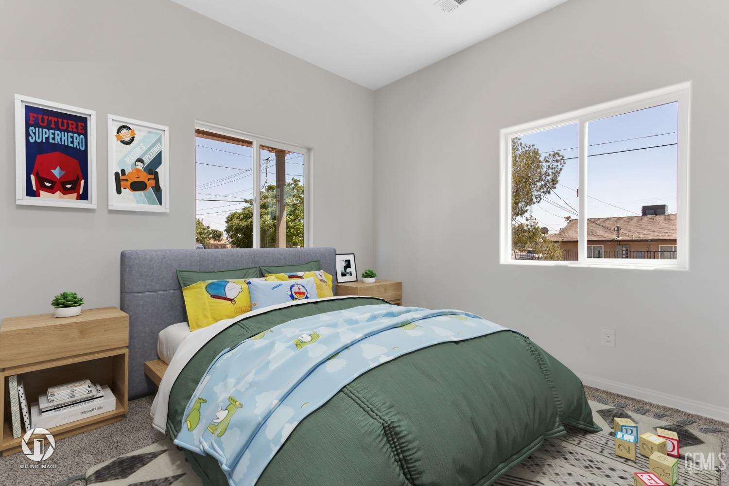 Undisclosed Address Bakersfield, CA 93305 - Photo 16 of 28 a bedroom with two beds and a window