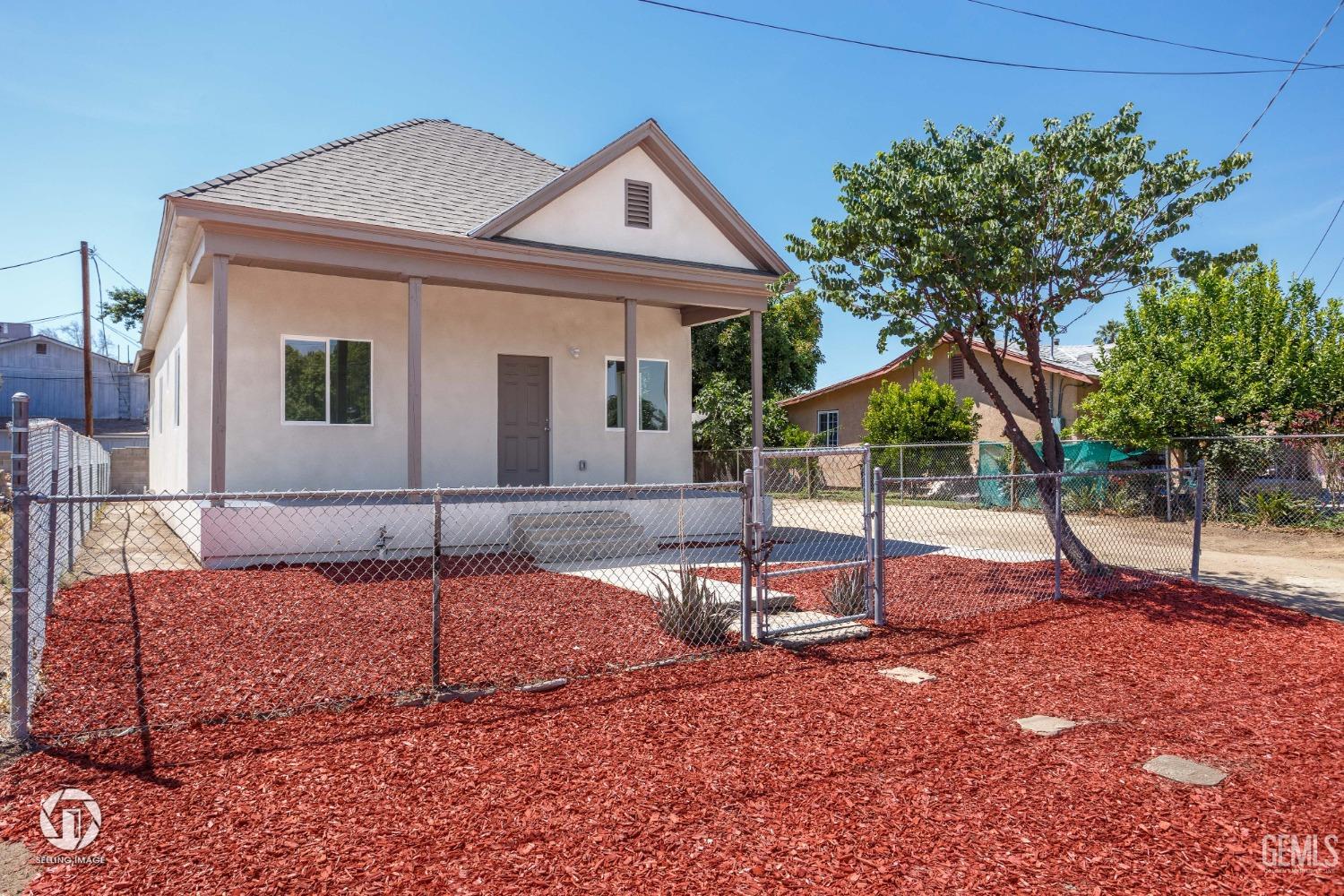 Undisclosed Address Bakersfield, CA 93305 - Photo 2 of 28 a house view with a backyard space