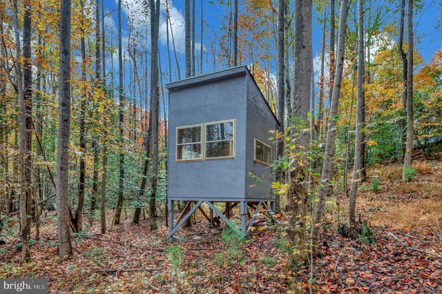 a view of a backyard with a barn