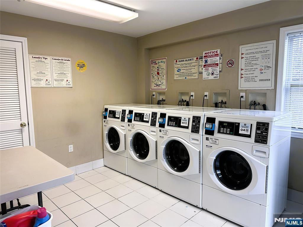 39 Union Street, Unit 105 Hackensack, NJ 07601 - Photo 14 of 22 a utility room with dryer and washer