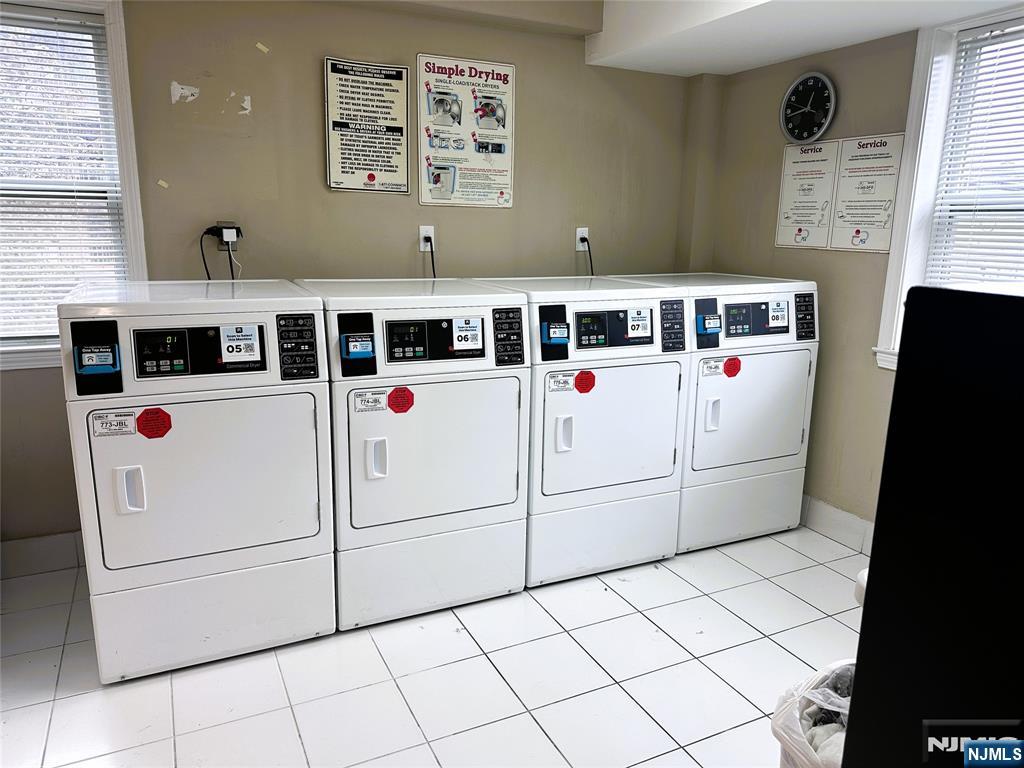 39 Union Street, Unit 105 Hackensack, NJ 07601 - Photo 15 of 22 a white house with dryer and washer