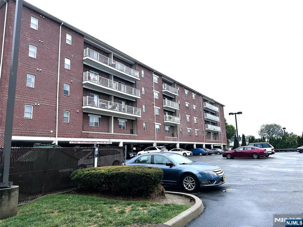 39 Union Street, Unit 105 Hackensack, NJ 07601 - Photo 21 of 22 a cars parked in front of a building