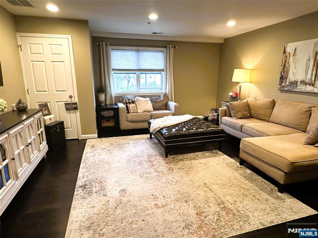 39 Union Street, Unit 105 Hackensack, NJ 07601 - Photo 5 of 22 a bedroom with a bed and a couch