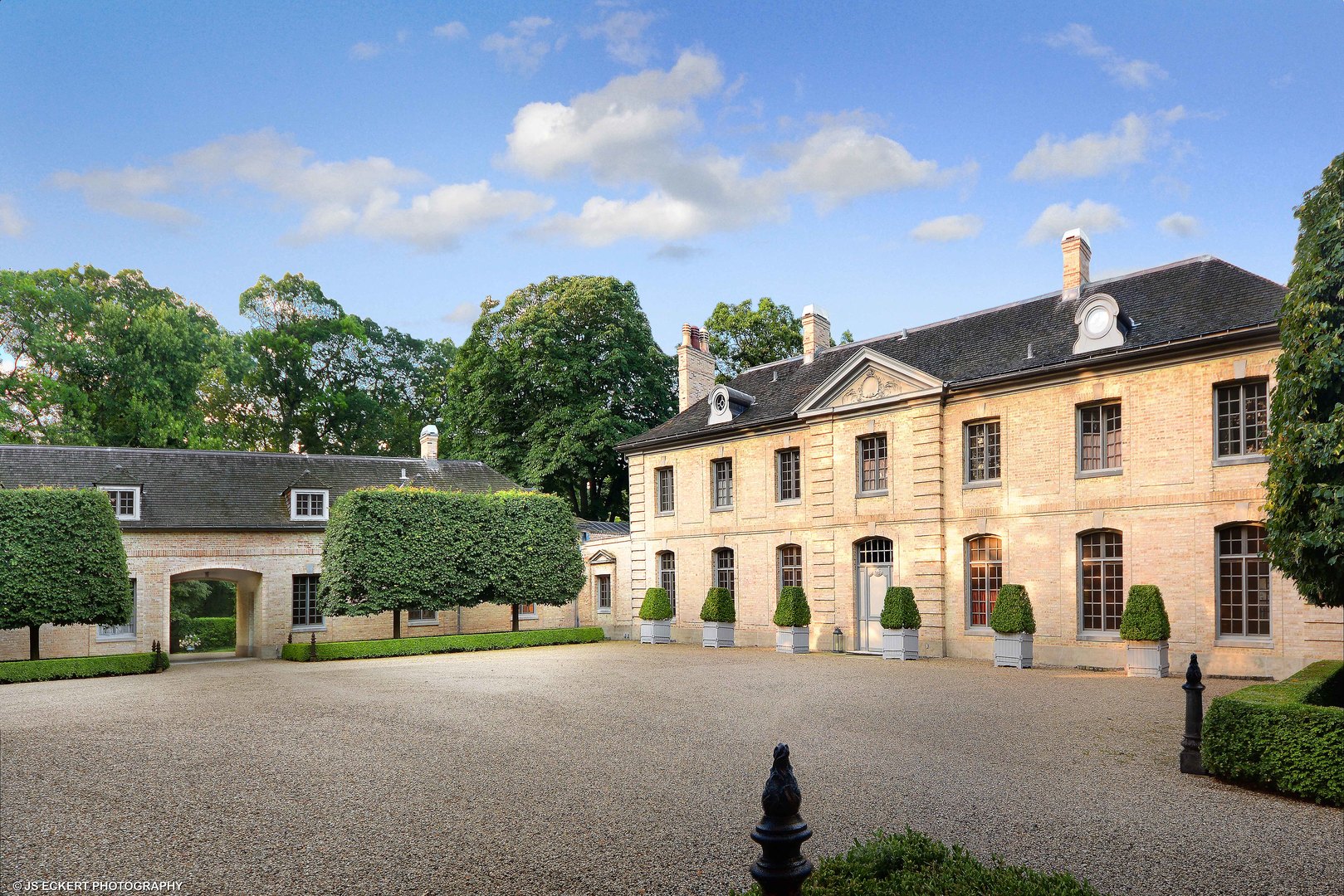 front view of a house with a street