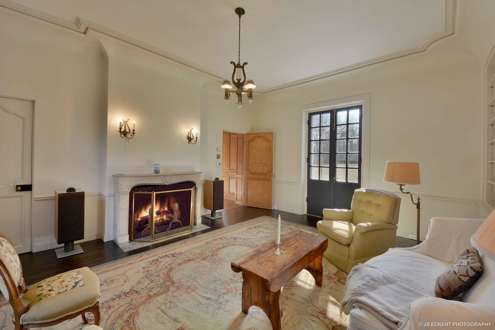 111 Moffett Road Lake Bluff, IL 60044 - Photo 15 of 51 a living room with furniture and a fireplace