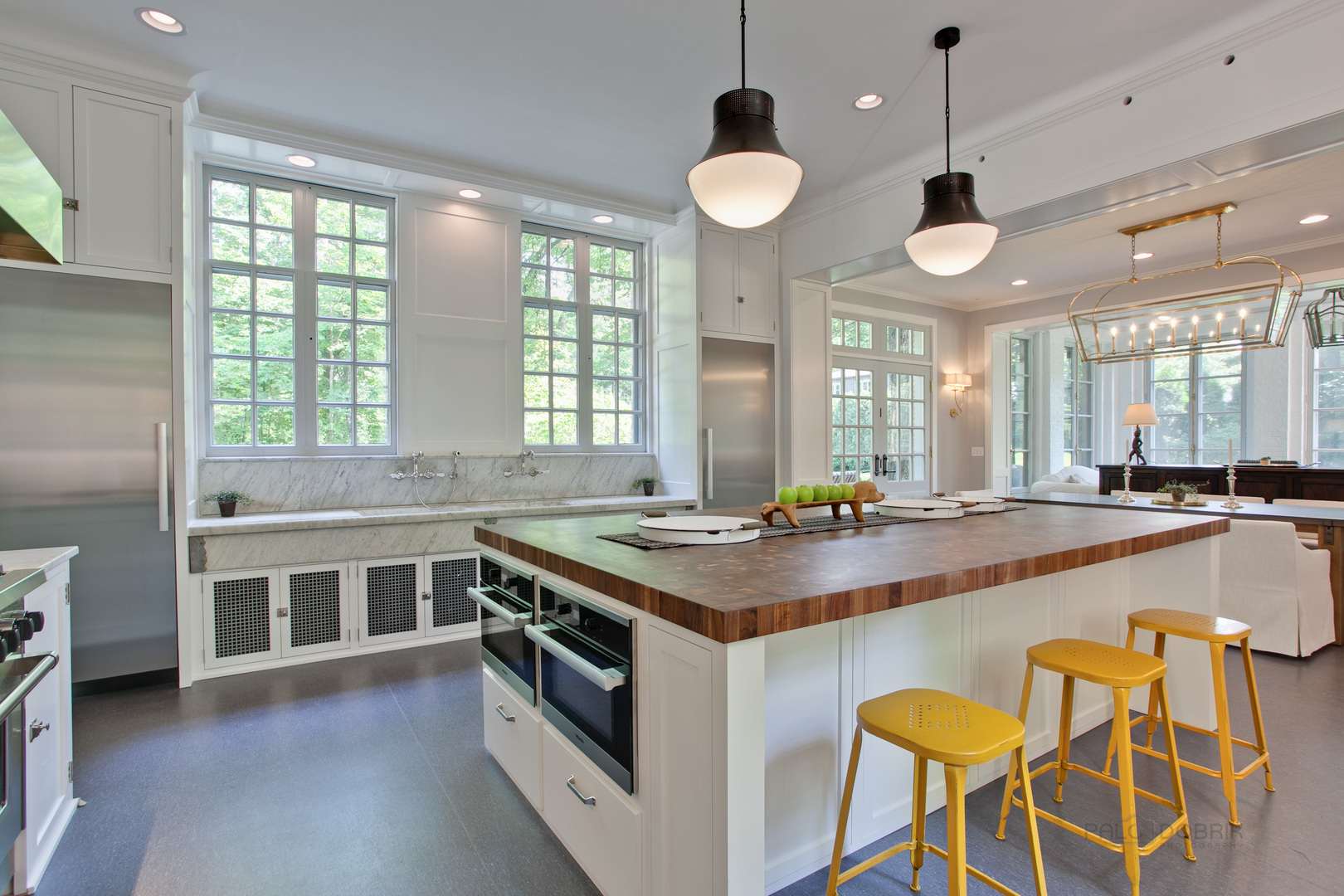 111 Moffett Road Lake Bluff, IL 60044 - Photo 22 of 51 a view of a kitchen counter top space with stainless steel appliances granite countertop a stove and a large window