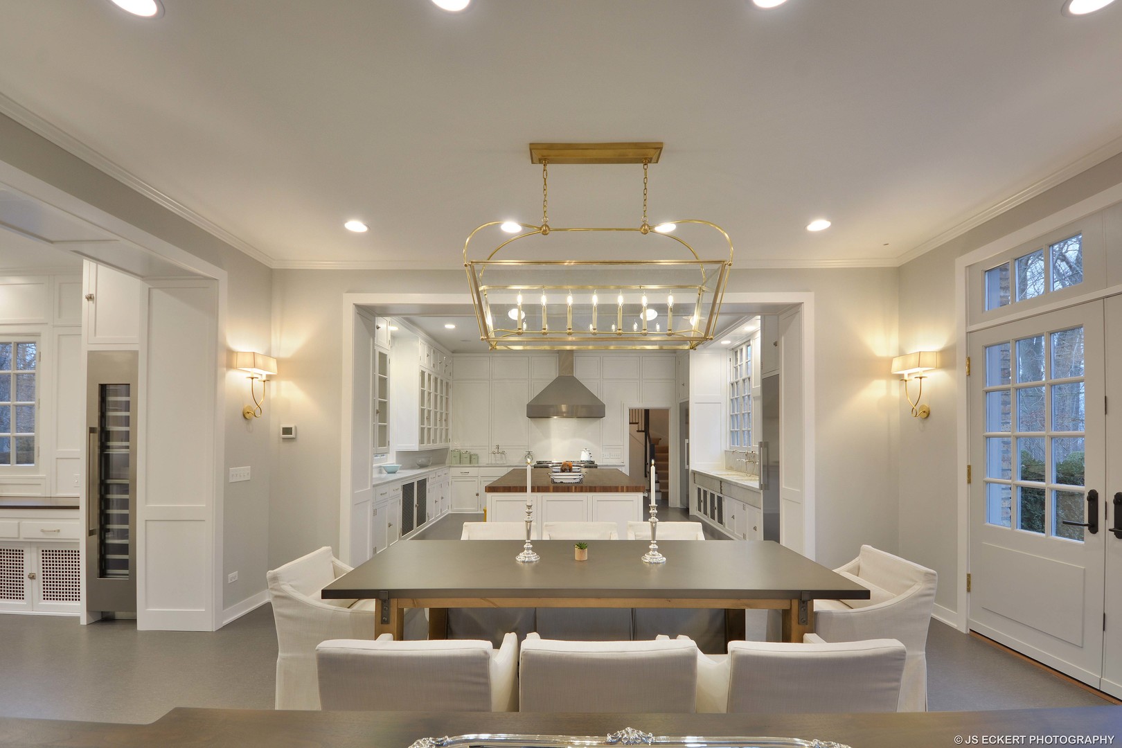 111 Moffett Road Lake Bluff, IL 60044 - Photo 26 of 51 a view of a dining room with furniture a chandelier and wooden floor