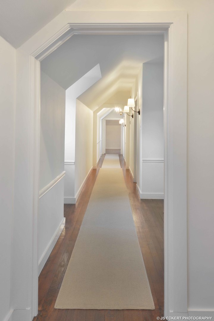 111 Moffett Road Lake Bluff, IL 60044 - Photo 40 of 51 a view of a hallway with wooden floor and staircase
