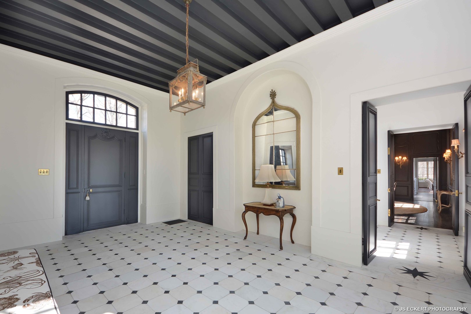 111 Moffett Road Lake Bluff, IL 60044 - Photo 10 of 51 a living room with a bed and a chair