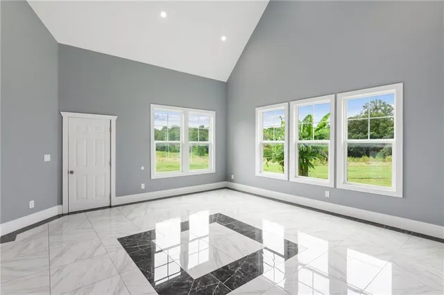a bathroom with a vanity a sink a mirror and a bathtub