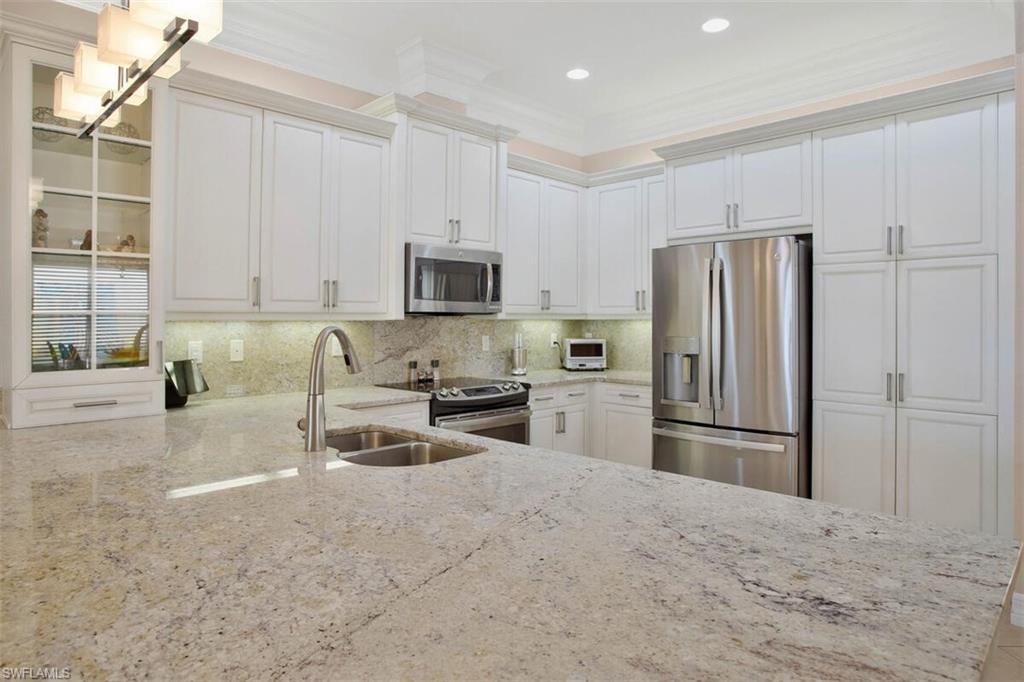 13517 Mandarin Circle Naples, FL 34109 - Photo 8 of 32