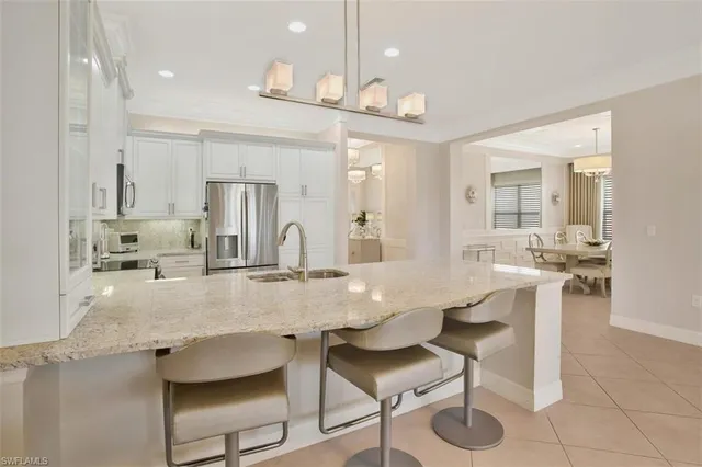 $975,000 | 13517 Mandarin Circle, Naples, FL 34109