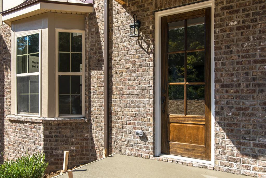 93 Hicks Edgen Road Pleasant View, TN 37146 - Photo 4 of 30 Mahogany front Door. Picture is a Builder Sample. Actual home built may vary.