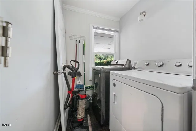 a backyard of a house with yard and outdoor seating