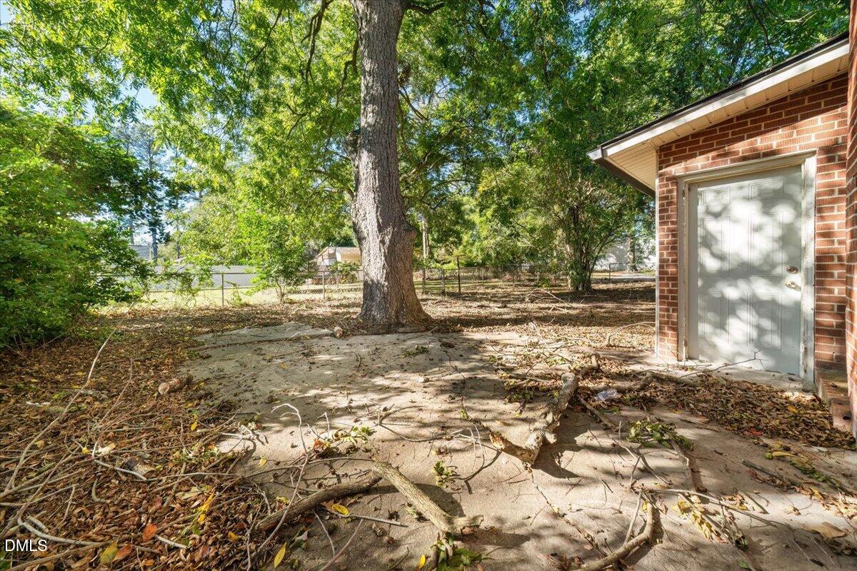 1213 Tarboro Street Southwest Wilson, NC 27893 - Photo 27 of 27 a view of backyard with green space