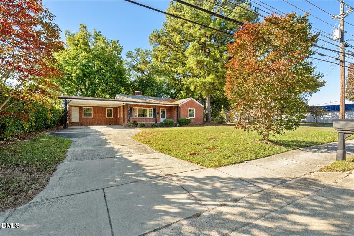 1213 Tarboro Street Southwest Wilson, NC 27893 - Photo 4 of 27 a view of house with outdoor space