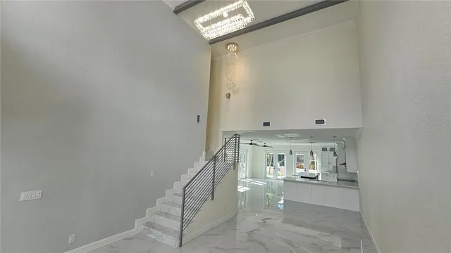 a view of entryway and hall with a window