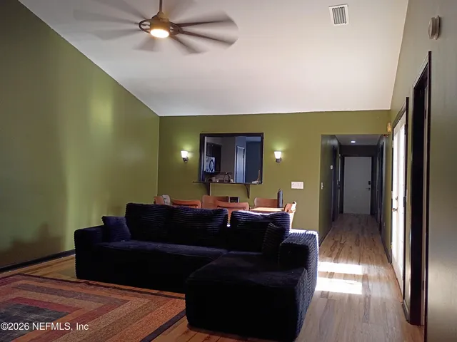 a kitchen with a sink stove and refrigerator