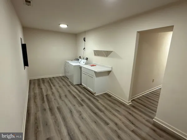 a view of utility room with closet area
