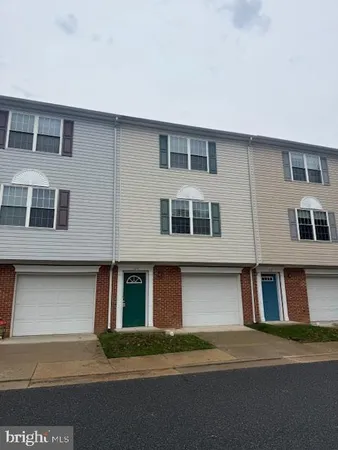 a front view of residential houses