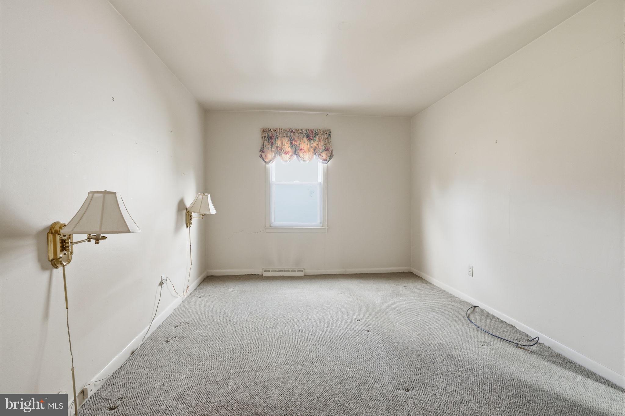 143 Pinehill Road Feasterville-Trevose, PA 19053 - Photo 18 of 43 an empty room with windows