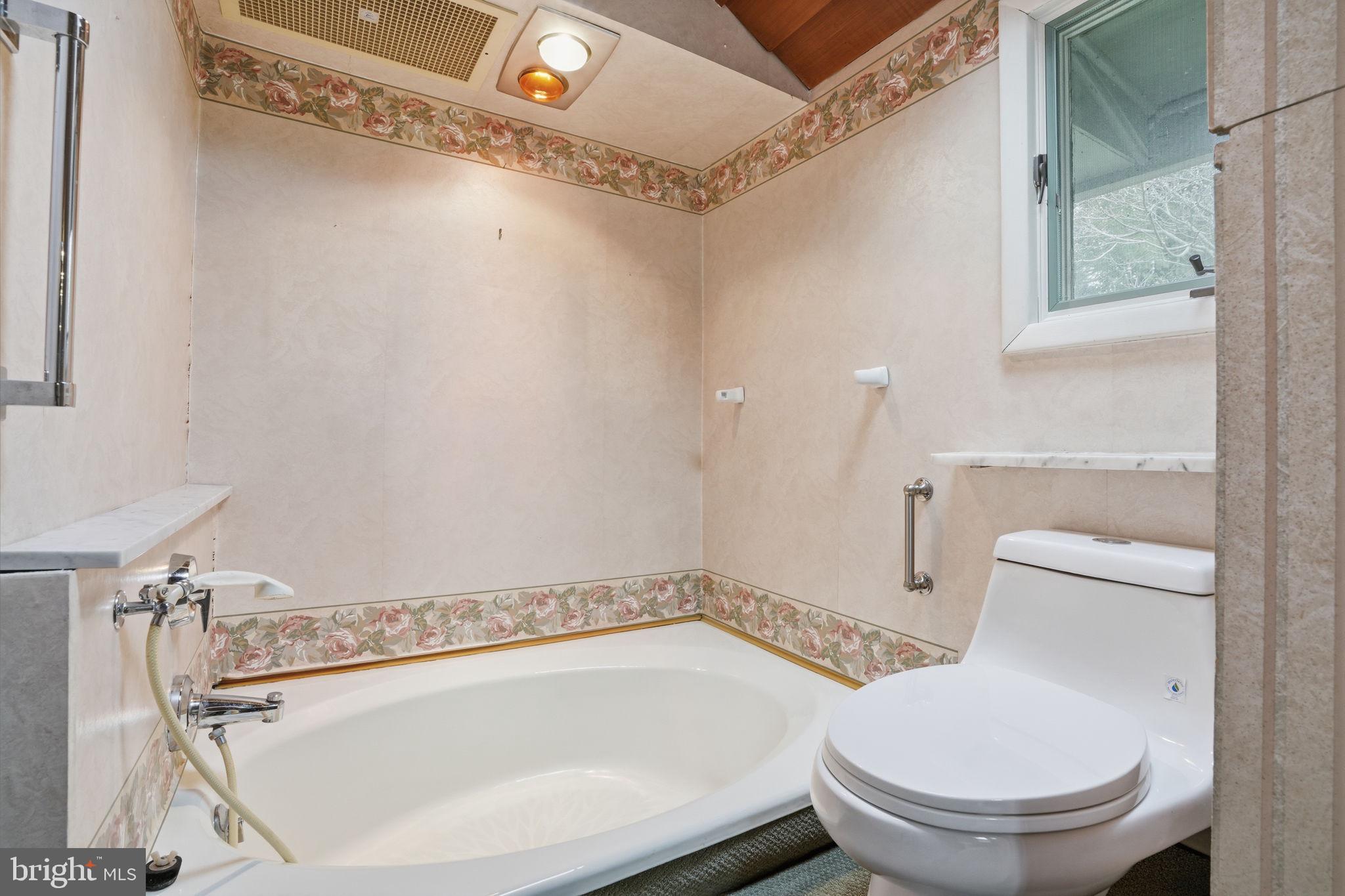 143 Pinehill Road Feasterville-Trevose, PA 19053 - Photo 20 of 43 a bathroom with a toilet and a bathtub