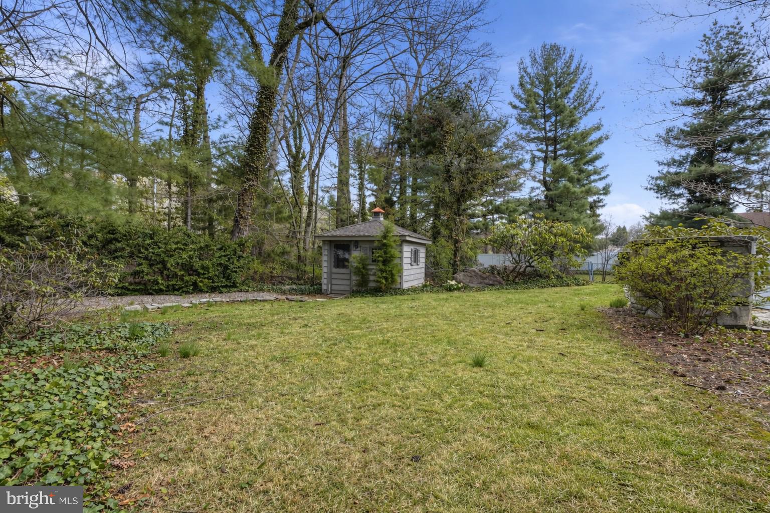 143 Pinehill Road Feasterville-Trevose, PA 19053 - Photo 39 of 43 a view of a backyard with large trees