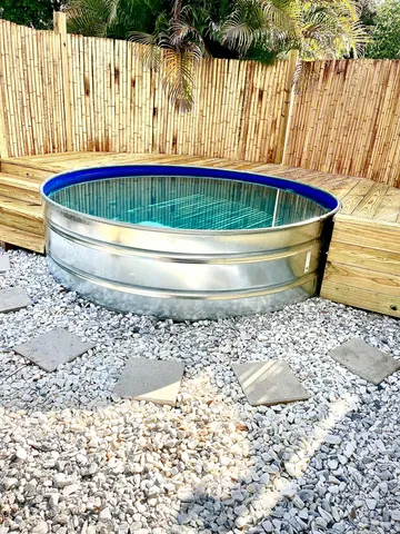 a white and blue tub sitting in a bathroom