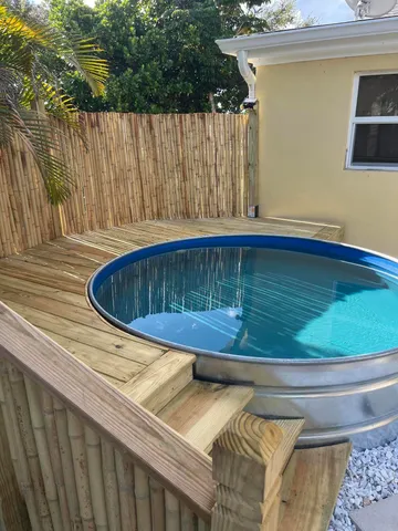 a view of outdoor space with swimming pool