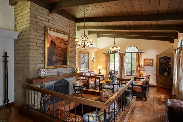 a view of a hallway view with wooden floor and staircase