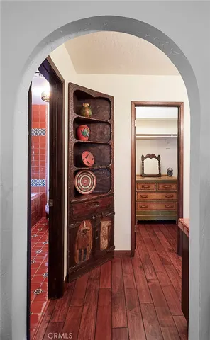 a view of house with outdoor space and sitting area