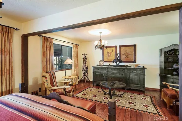 a room with furniture and a flat screen tv