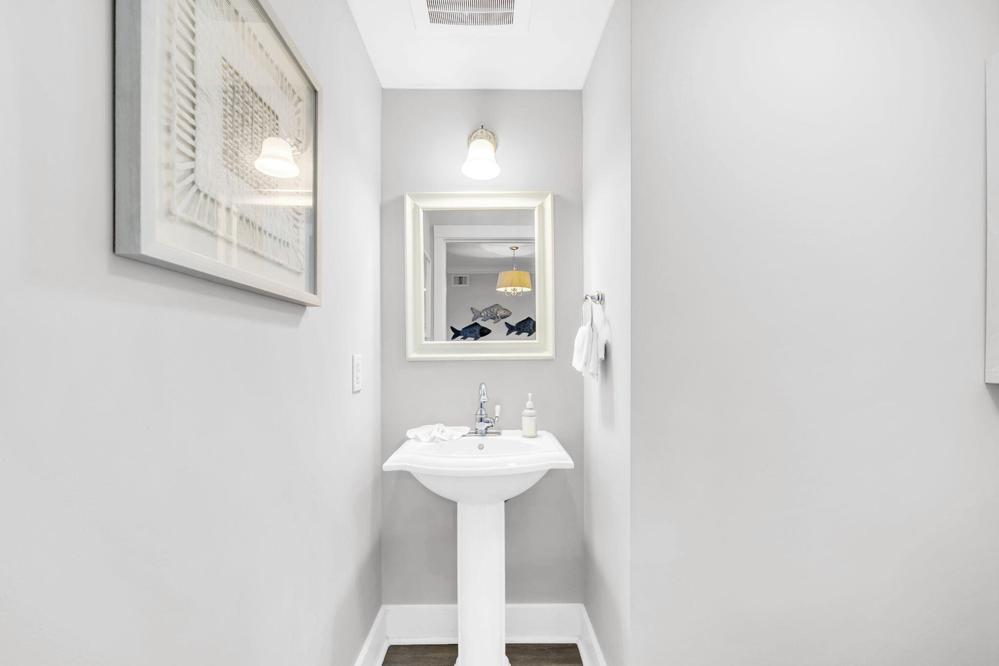 1110 Santa Rosa Boulevard, Unit A231 Fort Walton Beach, FL 32548 - Photo 11 of 59 a bathroom with a sink and a mirror