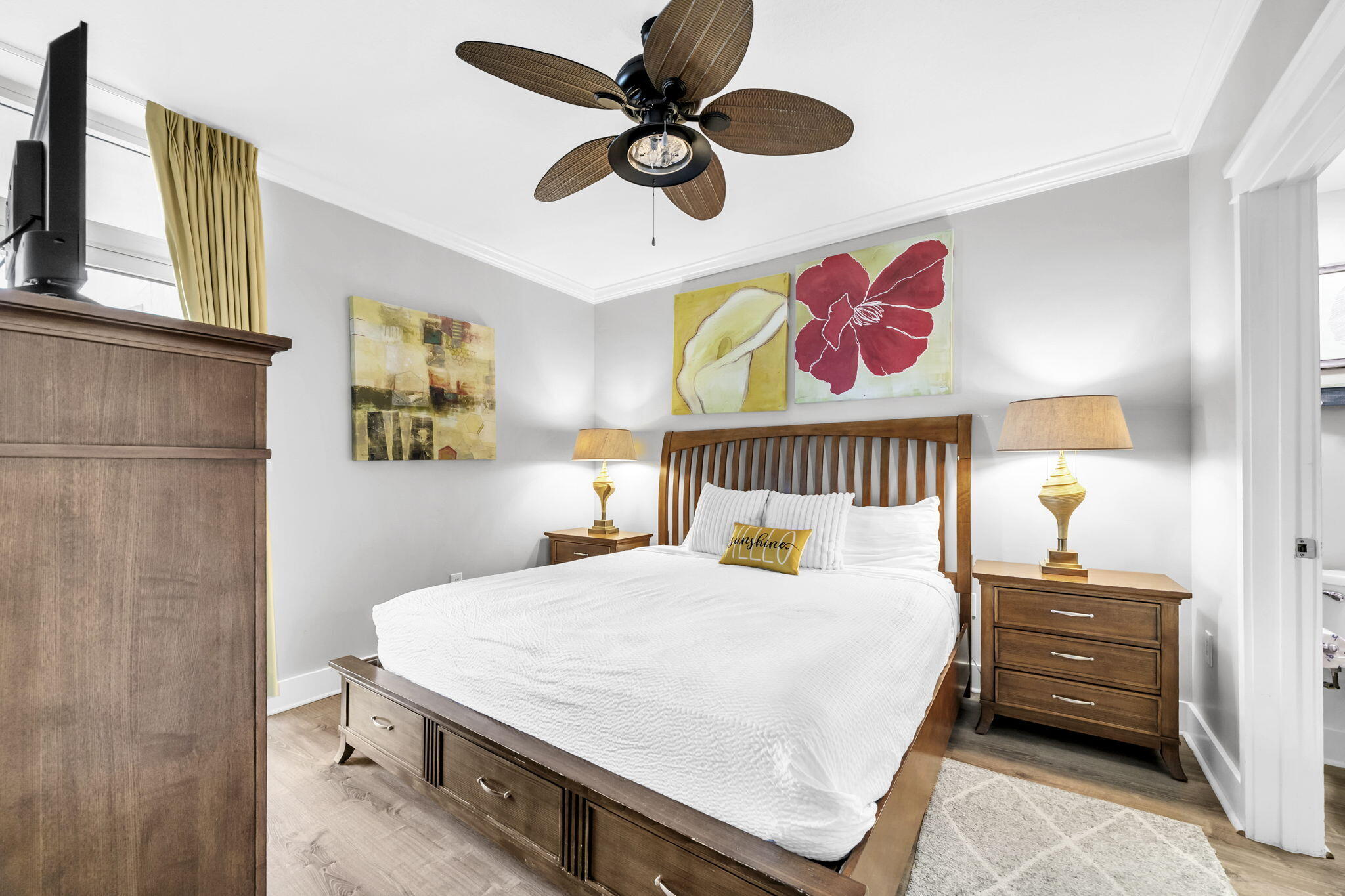 1110 Santa Rosa Boulevard, Unit A231 Fort Walton Beach, FL 32548 - Photo 17 of 59 a bedroom with a bed and a chandelier