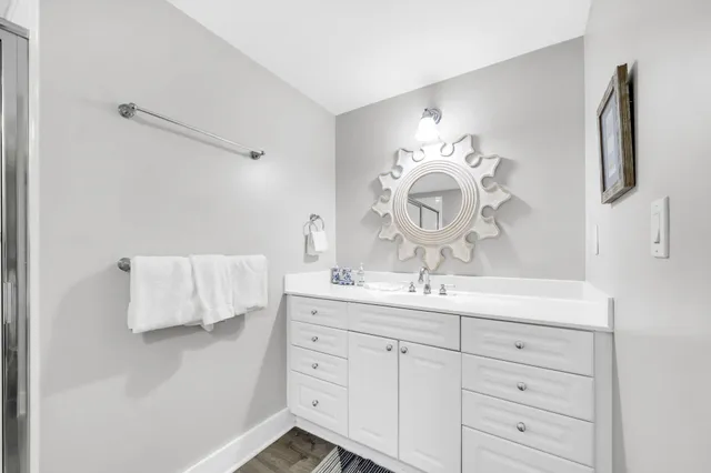 a bathroom with a bathtub and a sink