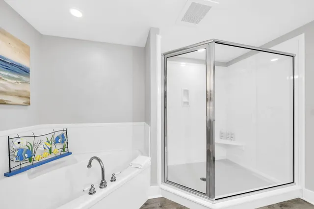 a view of a balcony with couches and city view