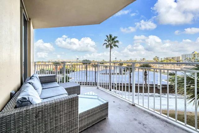 a view of balcony with furniture