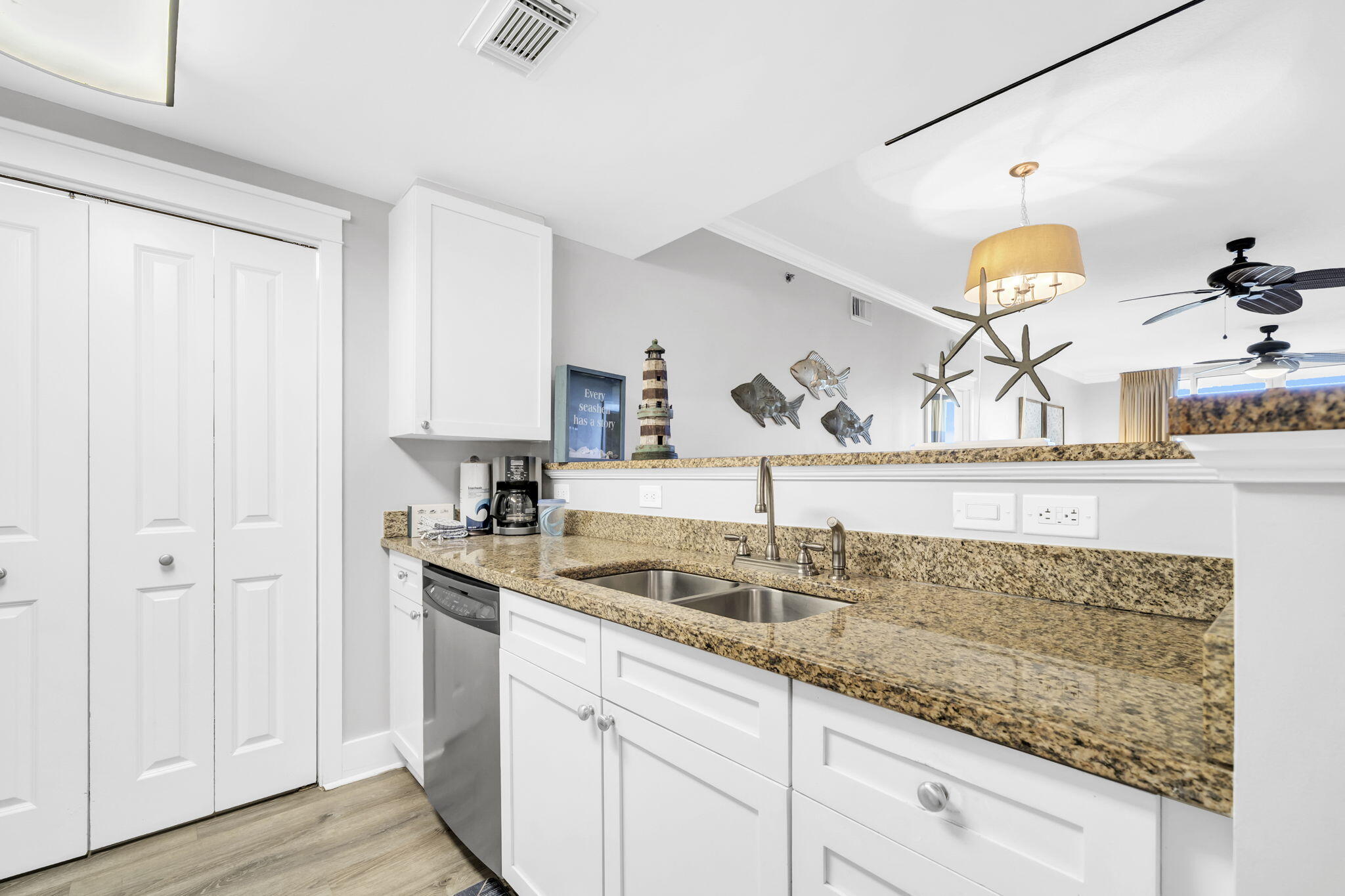 1110 Santa Rosa Boulevard, Unit A231 Fort Walton Beach, FL 32548 - Photo 4 of 59 a kitchen with a sink and a granite counter tops